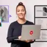 A woman holding a laptop smiles at the camera. Behind her are digital design elements, profile images, and a resume template on a screen, highlighting courses online. The Canva logo appears in the lower left corner.