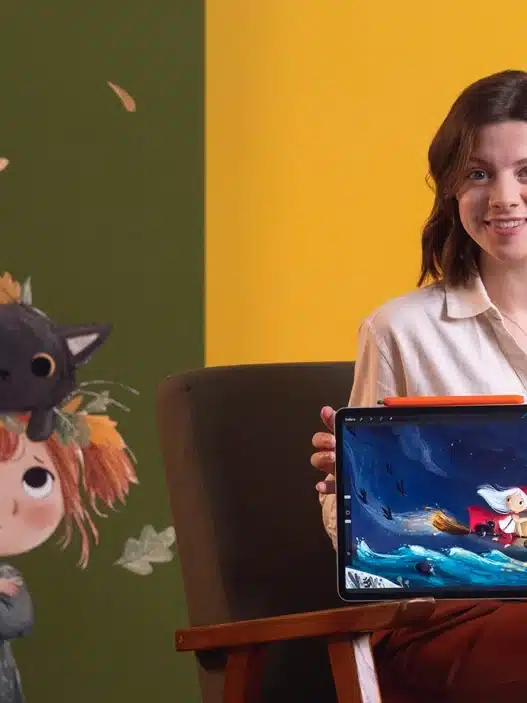 A woman sits on a chair against a yellow wall, smiling and holding a tablet displaying digital art. Next to her is an illustrated character with a black cat on her head, set against a green background. Procreate logo and courses online are visible.