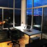 Cozy home office setup with laptop at night