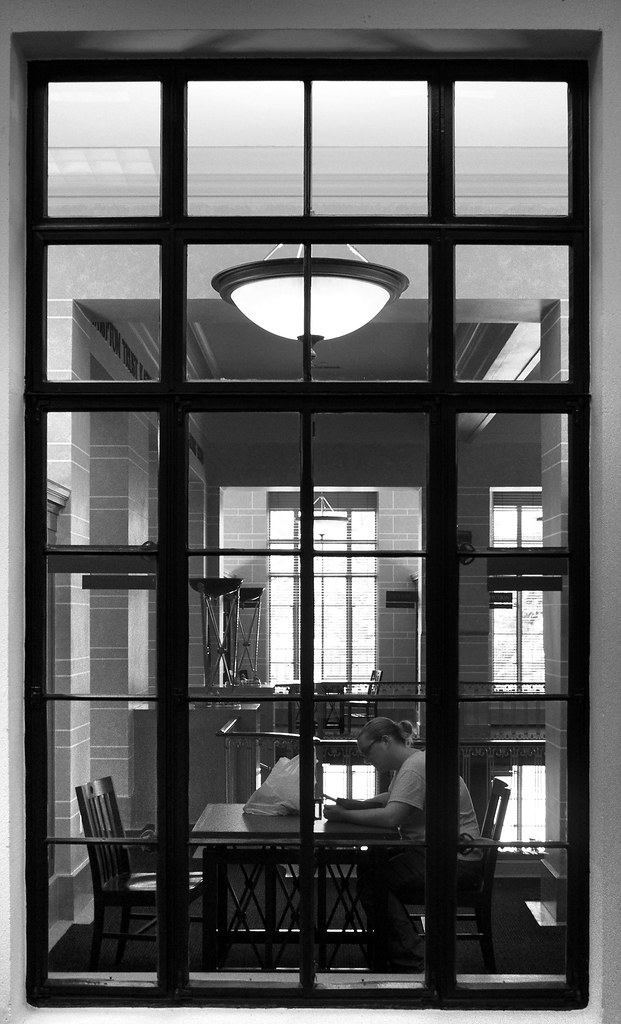 Reading in a quiet corner of a public library
