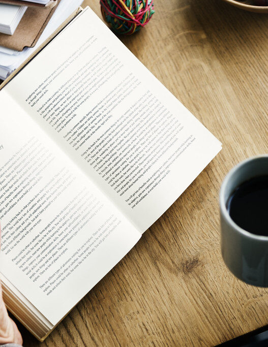 Coffee break while reading a travel book