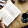 Coffee break while reading a travel book