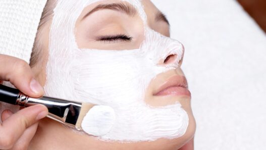 Woman receiving a professional facial treatment at a spa