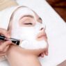 Woman receiving a professional facial treatment at a spa