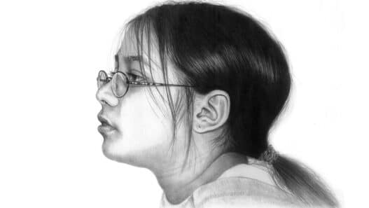 Pencil portrait sketch of a woman with glasses
