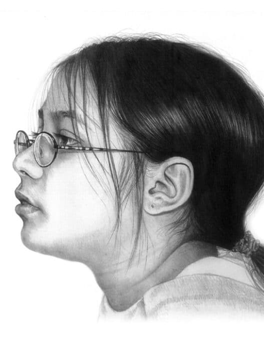 Pencil portrait sketch of a woman with glasses