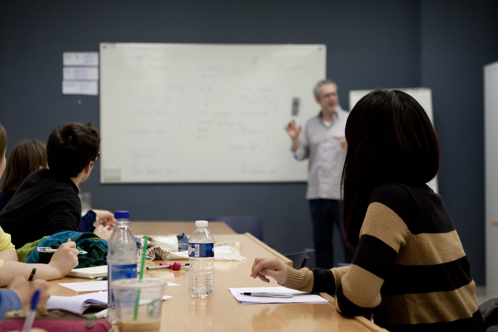 Language learners collaborating in a workshop session
