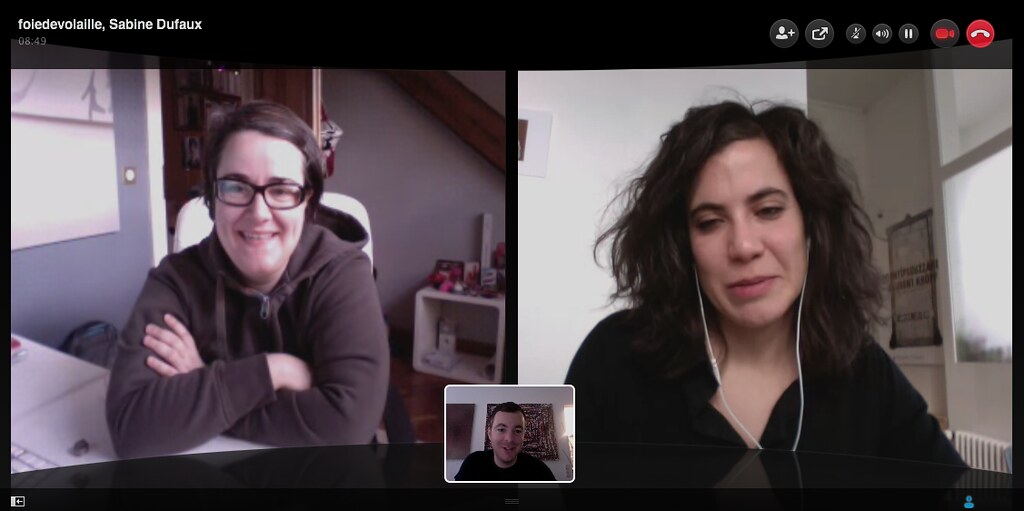 Screenshot of a video call with three participants