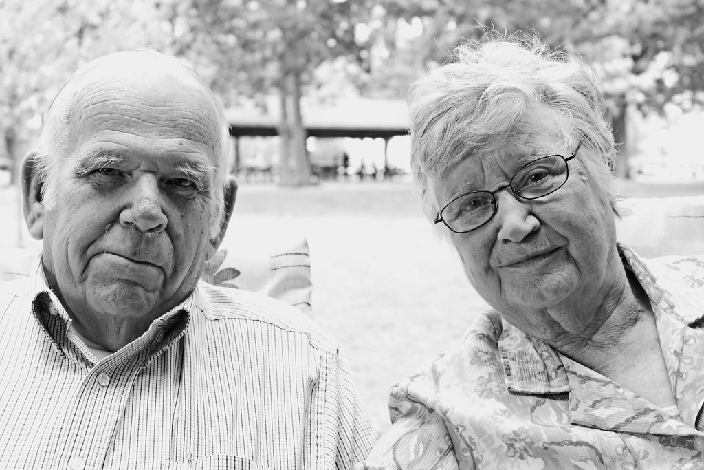 An older couple celebrating together, smiling