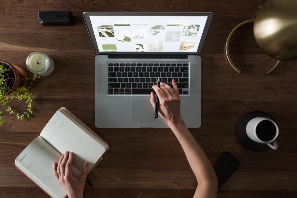 A laptop on a desk ready for an online study session