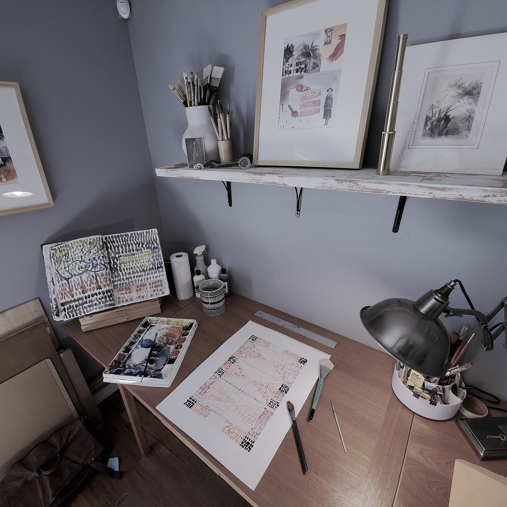 Interior of artist Bruce Black's studio with artwork on display