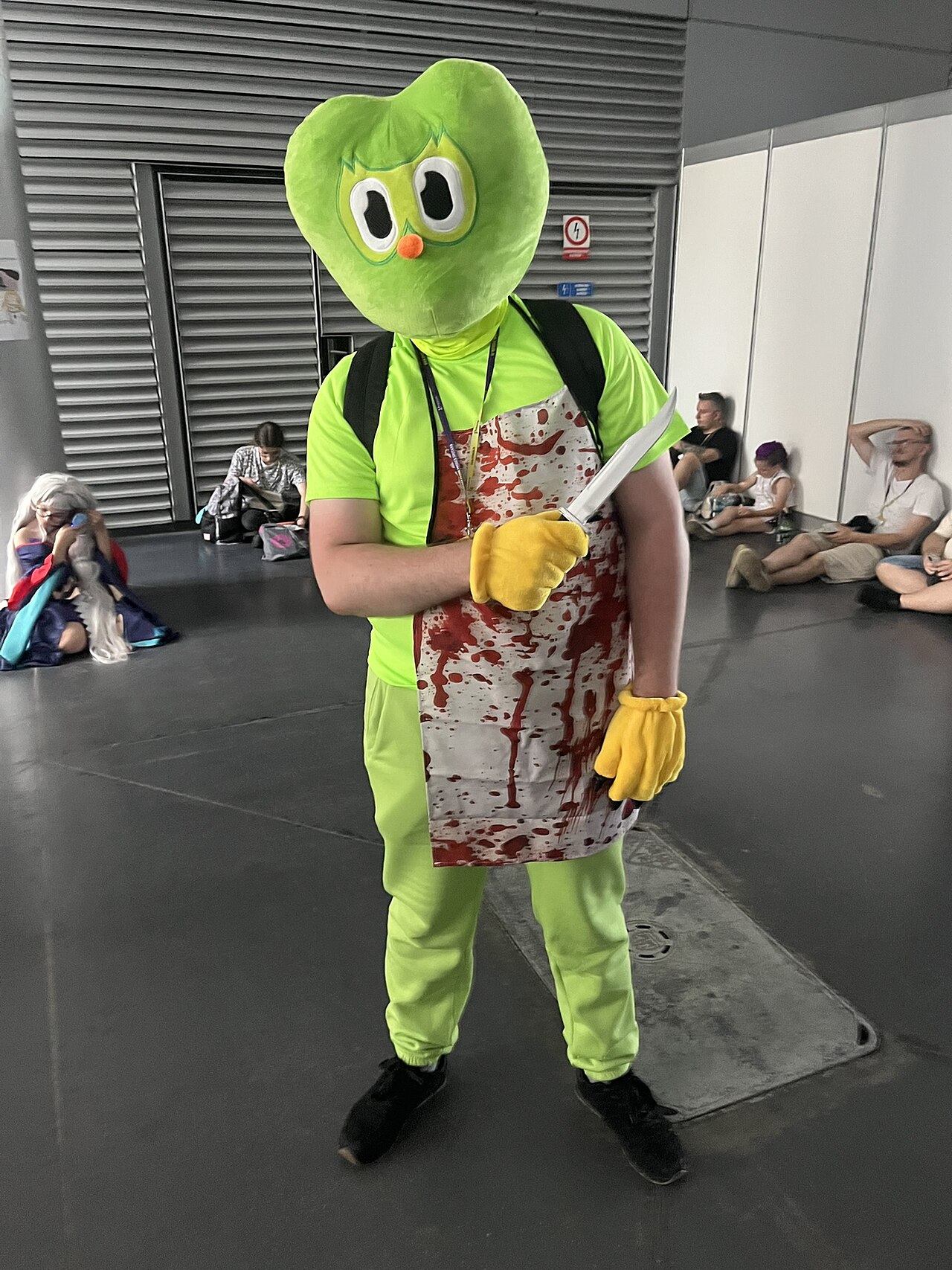 Duolingo branding and mascot display at a convention